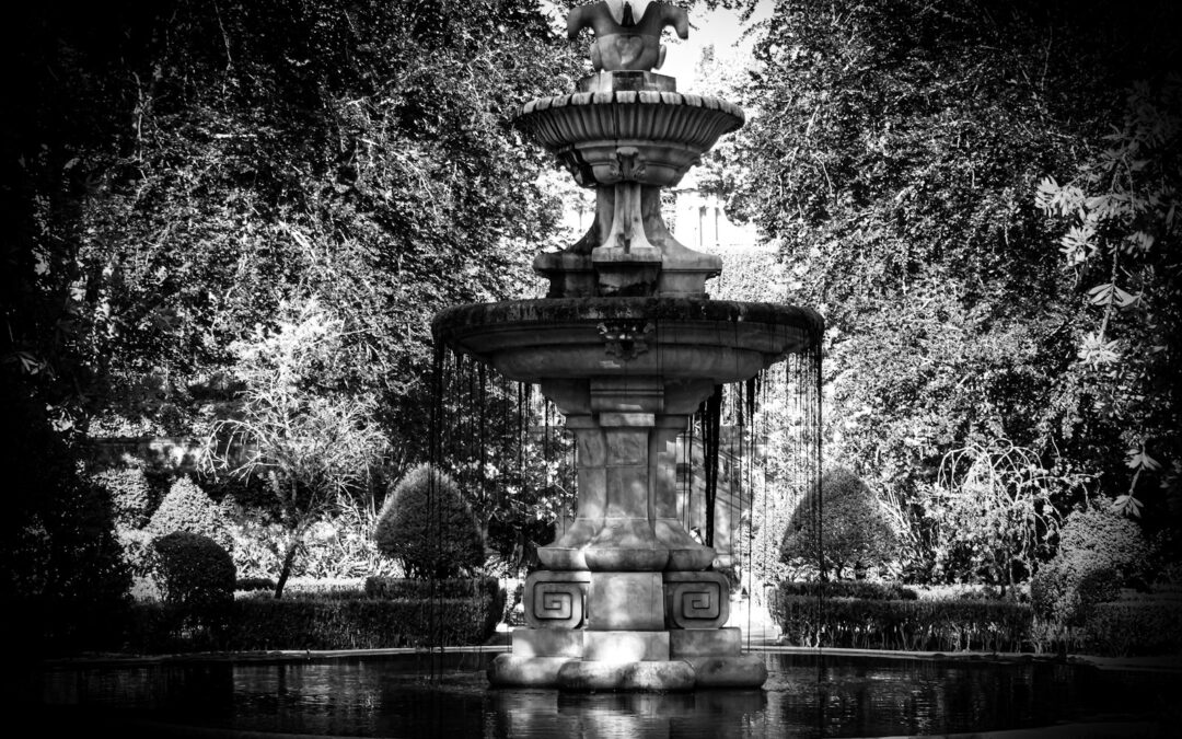 a water fountain in a park